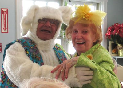 Residents enjoying a festive celebration with costumes.