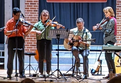 Musicians performing in a community event
