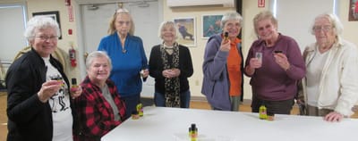 Residents engaging in an art activity together