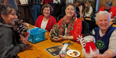 Residents engaging in a holiday craft activity.
