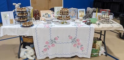 Decorated table with food and crafts for an event