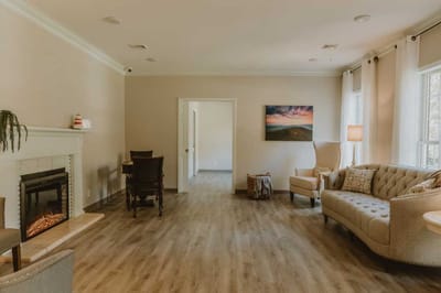 Cozy common area with seating and fireplace
