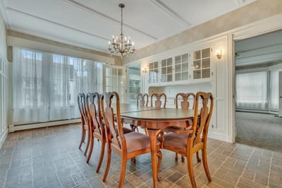 Interior dining area with a large wooden table