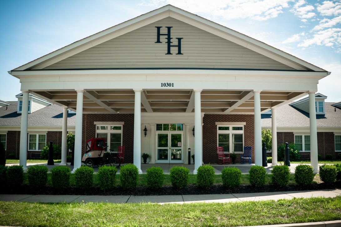 Exterior view of the facility with a covered entrance