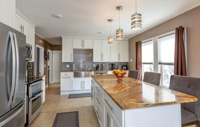 Modern kitchen interior with an island and appliances