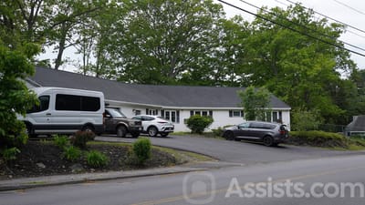 Exterior view of the facility with parking area