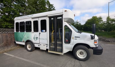 Facility transport bus parked outside
