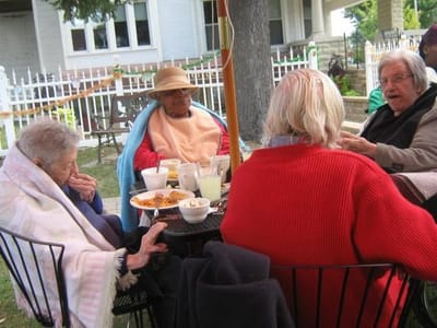 Residents enjoying food outdoors