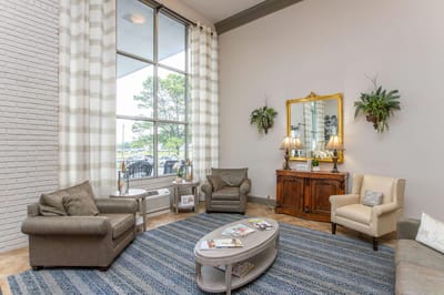 Cozy common area with seating and natural light.