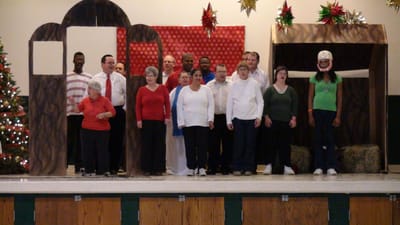Group of residents performing on stage