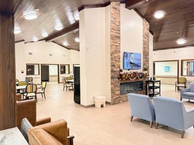 Common area with comfortable seating and a fireplace