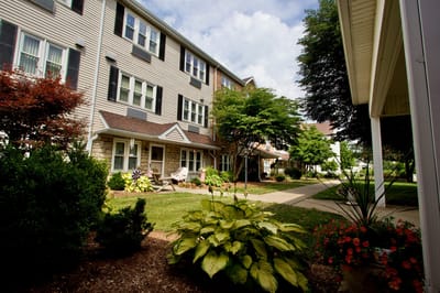 Exterior view of Westminster Place with landscaped garden.