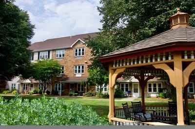 Exterior view of a facility with a gazebo.