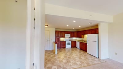 Spacious kitchen area with appliances