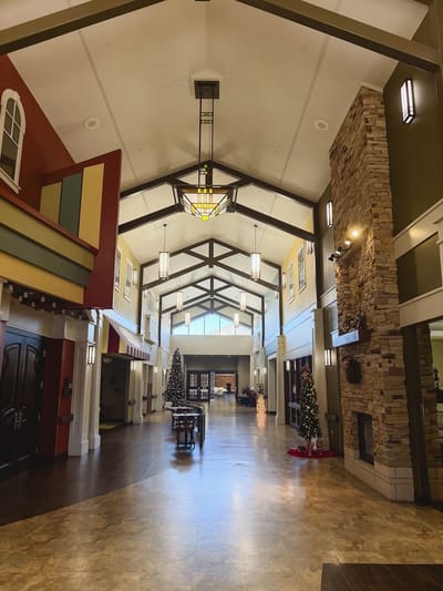 Interior view of a festive common area with decorations