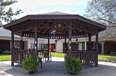 Outdoor gazebo in a landscaped area