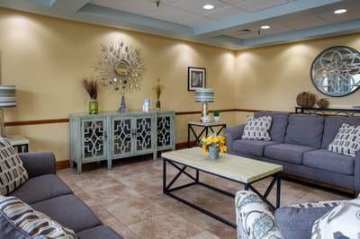 Comfortable seating area with decorative elements.