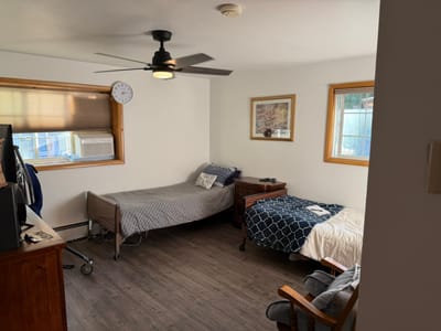 A shared resident room with two beds.