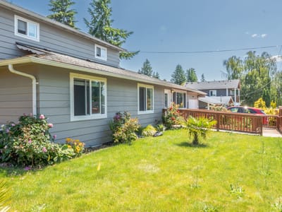 Well-maintained outdoor space with garden and house