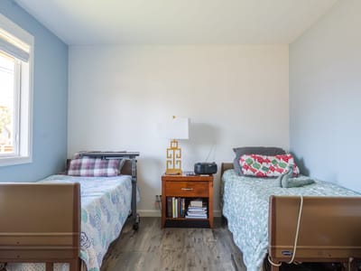 Two furnished resident rooms with twin beds