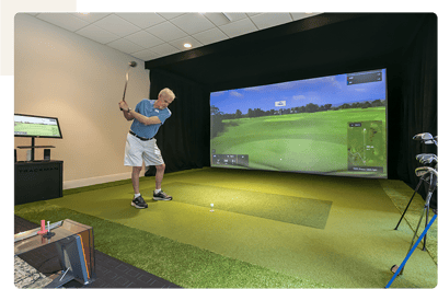 Resident enjoying indoor golf activity.