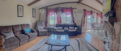 Cozy common area with comfortable seating and natural light.