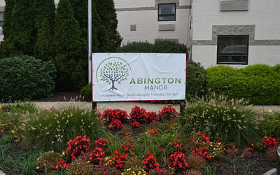 Abington Manor facility sign with logo
