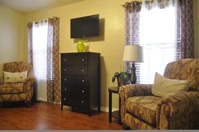 Interior of a cozy sitting area with furniture