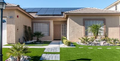 Exterior view of Henderson Care Home with solar panels