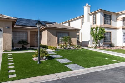 Exterior view of a residential building with landscaping