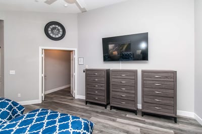 Interior view of a furnished resident room with modern decor