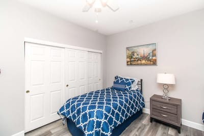 Private resident room with bed and furniture