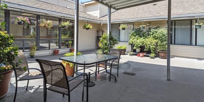 Inviting outdoor seating area with plants and flowers