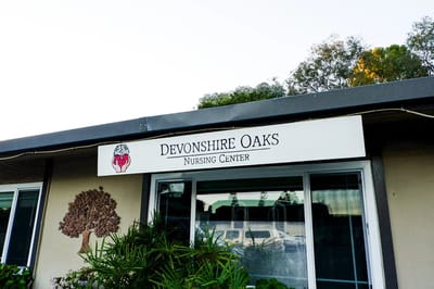 Exterior view of Devonshire Oaks Nursing Center entrance