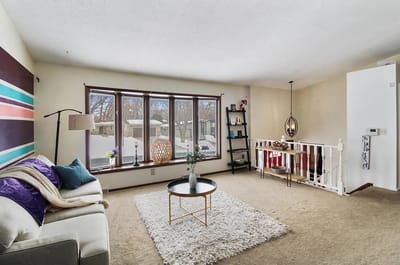 Bright common area with seating and decor