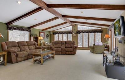 Bright common area with comfortable seating and large windows