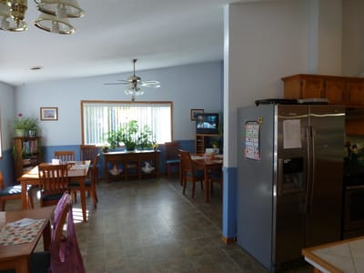 Interior view of a common area with dining tables
