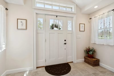 Entrance hall with door and decorations