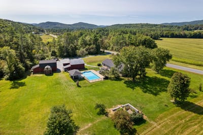 Aerial view of outdoor space with a pool.