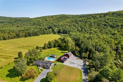 Aerial view of residential facility with outdoor spaces.