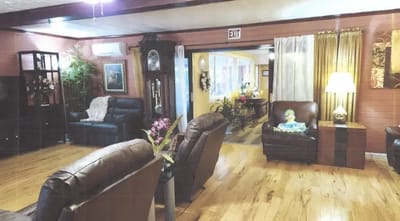 Cozy common area with seating and decor.