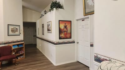 Interior hallway with artwork and seating