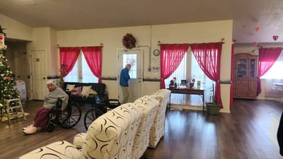 Common area with residents and holiday decorations