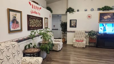 Comfortable seating area with Valentine's decorations.