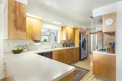 Bright kitchen with wooden cabinets and appliances.