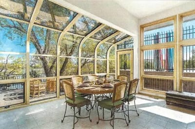 Bright dining area with large windows