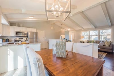 Bright and inviting common area with dining and living spaces