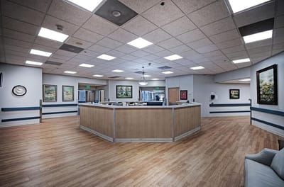 Bright and spacious lobby area with wooden flooring