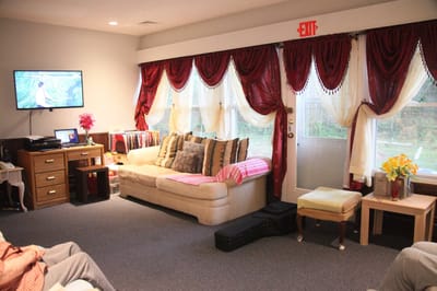 Cozy common area with a couch and TV