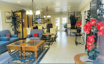 Bright common area with seating and plants